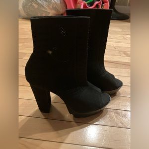 Used once, black sock like material peep toe boot heels, super comfy